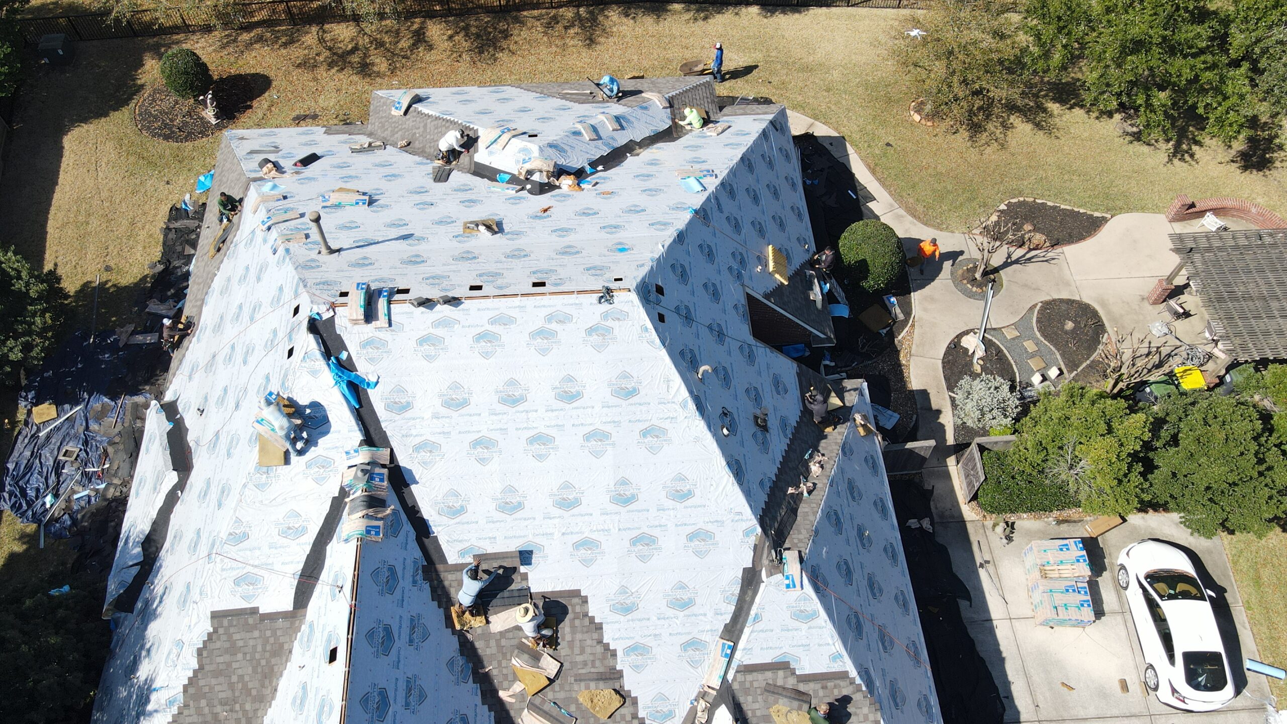 Catch-All landscaping protection system during South Houston roof installation